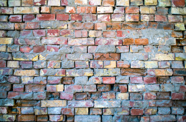 The texture of an old brick wall.