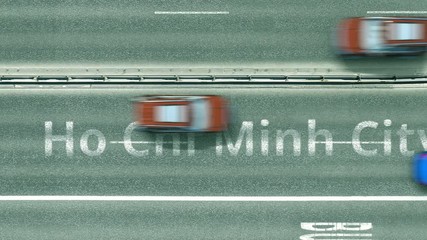Top down view of the highway with revealing Ho Chi Minh City text. Driving in Vietnam intro clip