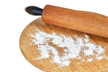 Wooden Rolling Pin on a Cutting Board with Flour and Sprinkles
