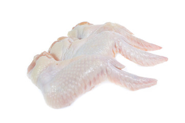 Raw chicken  on cutting board on white background