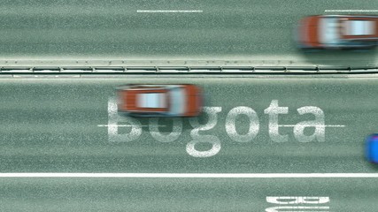 Top down view of the highway with revealing Bogota text. Driving in Colombia intro clip