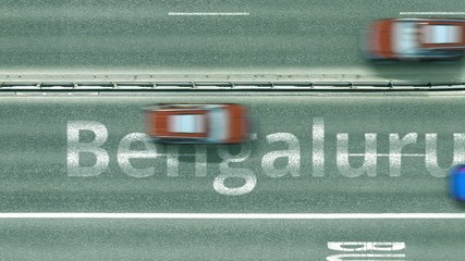 Top down view of the highway with revealing Bengaluru text. Driving to India intro clip