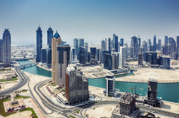 Aerial view on skyscrapers of Dubai, UAE, on a summer day - 285576353