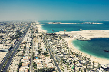 Aerial view on the beach of Dubai, UAE, on a summer day.