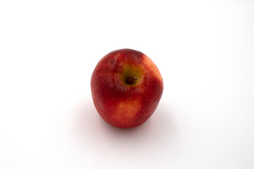 Fresh whole of royal gala red apple isolated on white background. Top view.