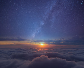 Beauty in nature background. Milky way with sunset and cloud in purple blue tone. © newroadboy