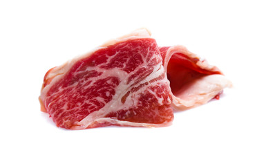 Fresh raw beef meat slices isolated over white background