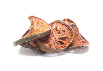 Dry bael fruit on white background
