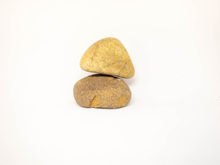 Fototapeta na wymiar Simple poise stones, Different kind of pebbles stones with a soft shadow against white background