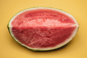 piece of  watermelon on yellow background