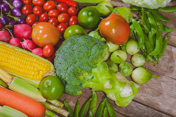 Backgroud of fresh food tasty and healthy varis vegetables are on the wooden table