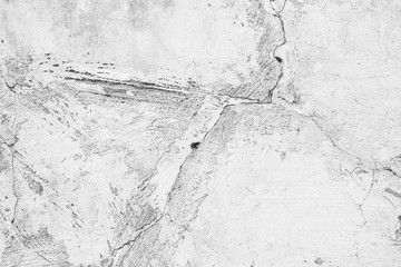Texture of a concrete wall with cracks and scratches which can be used as a background