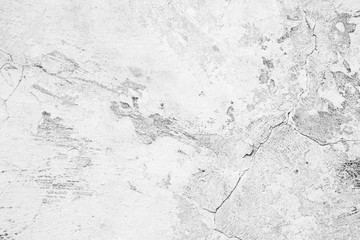 Texture of a concrete wall with cracks and scratches which can be used as a background