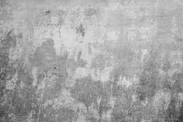 Fototapeta premium Texture of a concrete wall with cracks and scratches which can be used as a background