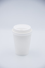 Takeaway paper coffee cup isolated on white background