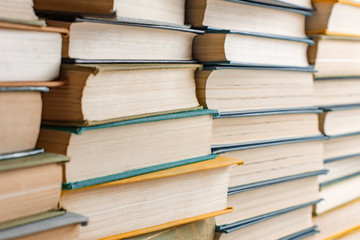 Old and used hardcover books. Educational concept. Close up