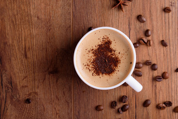 Homemade Christmas cookies with spices, and coffee with milk