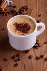 Homemade Christmas cookies with spices, and coffee with milk