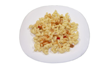 A white plate of macaroni with ketchup. Isolated on white background with clipping path. Close-up.