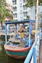 Fototapeta na wymiar Kolkata, India-July 27,2019: Floating Market in Kolkata- the first in Bengal opened up this January. Infact it is India’s first of its kind market been developed on The Lake of Patuli near EM Bypass.