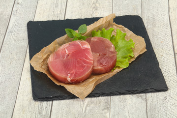 Raw tuna round steak for grill