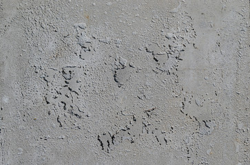 Urban concrete wall background with grooves and bubbles. Cement gray wall. Urban and...