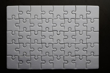 Jigsaw puzzle white colour,Puzzle pieces grid,Success.