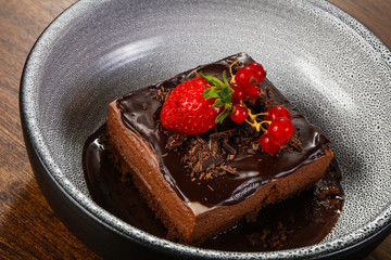 Sweet chocolate cake served strawberry