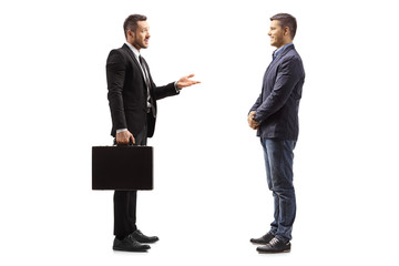 Businessman talking to a man