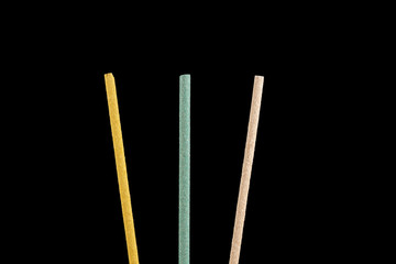 Incense is used for aesthetic reasons, and in therapy, meditation, and ceremony. It may also be used as a simple deodorant or insectifuge. Three sticks with black background                 