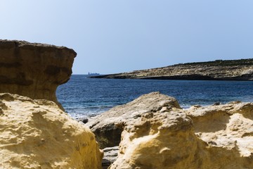 Fototapeta na wymiar Cove on the Mediterranean coast, island of Malta.