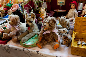 Vienna,Austria-November 07,2010:.group of vintage dolls and ancient plush animals