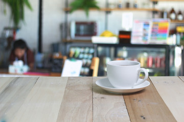 Hot Coffee cup  on the wooden table
