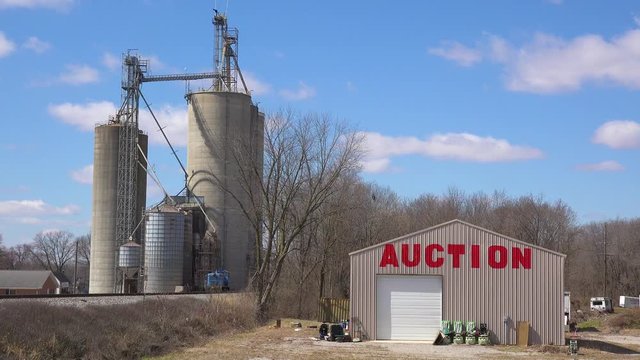 An auction house in an industrial area of a small midwestern American town. 