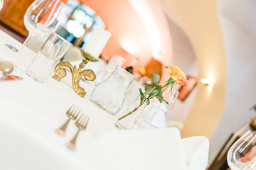 holy communion on wooden table on church.Taking Communion.Cup of glass with red wine, bread and Holy Bible and Cross on wooden table.black and white.