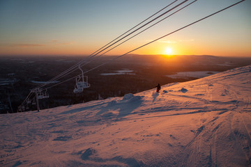 Winter mountains panorama with ski slopes and ski lifts near Vogel ski center, Slovenia