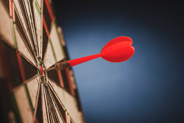 Red dart in the center of a target