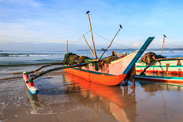 Traditional fishing boat on beach, Sri Lanka