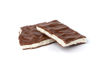 Chocolate bar with coconut filling isolated on white background.