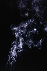 Grey smoke waves on black background