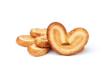 Palmier cookies or puff pastry ears isolated on white background.