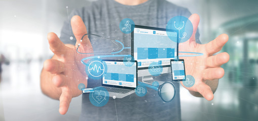 Businessman holding Devices with medical icon and stethoscope 3d rendering