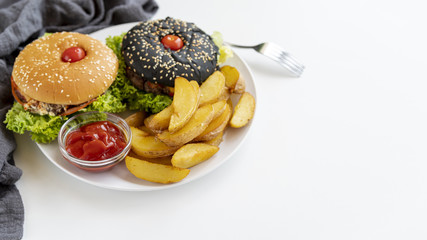 Close-up hamburgers with fries