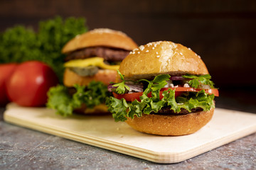 Close-up hamburgers on cutting board