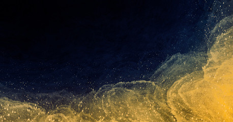 Abstract watercolor paint in deep blue and gold color glitter mixed with curve fluid texture for luxury background concept.