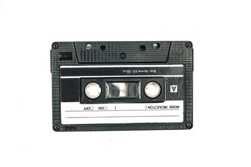 Close up image of a vintage audio cassette tape isolated on white background. Top view