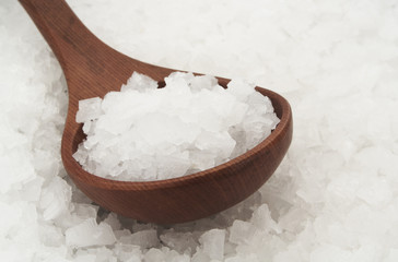 Organic sea salt and wooden spoon 