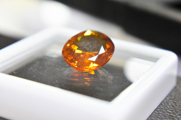 Yellow gemstone is a natural gemstone that has been cut through Is an expensive gem