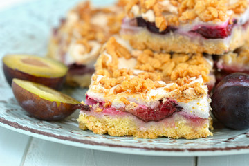 Plum cake. Homemade shortcrust pastry with purple plums.