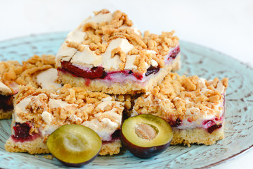 Plum cake. Homemade shortcrust pastry with purple plums.